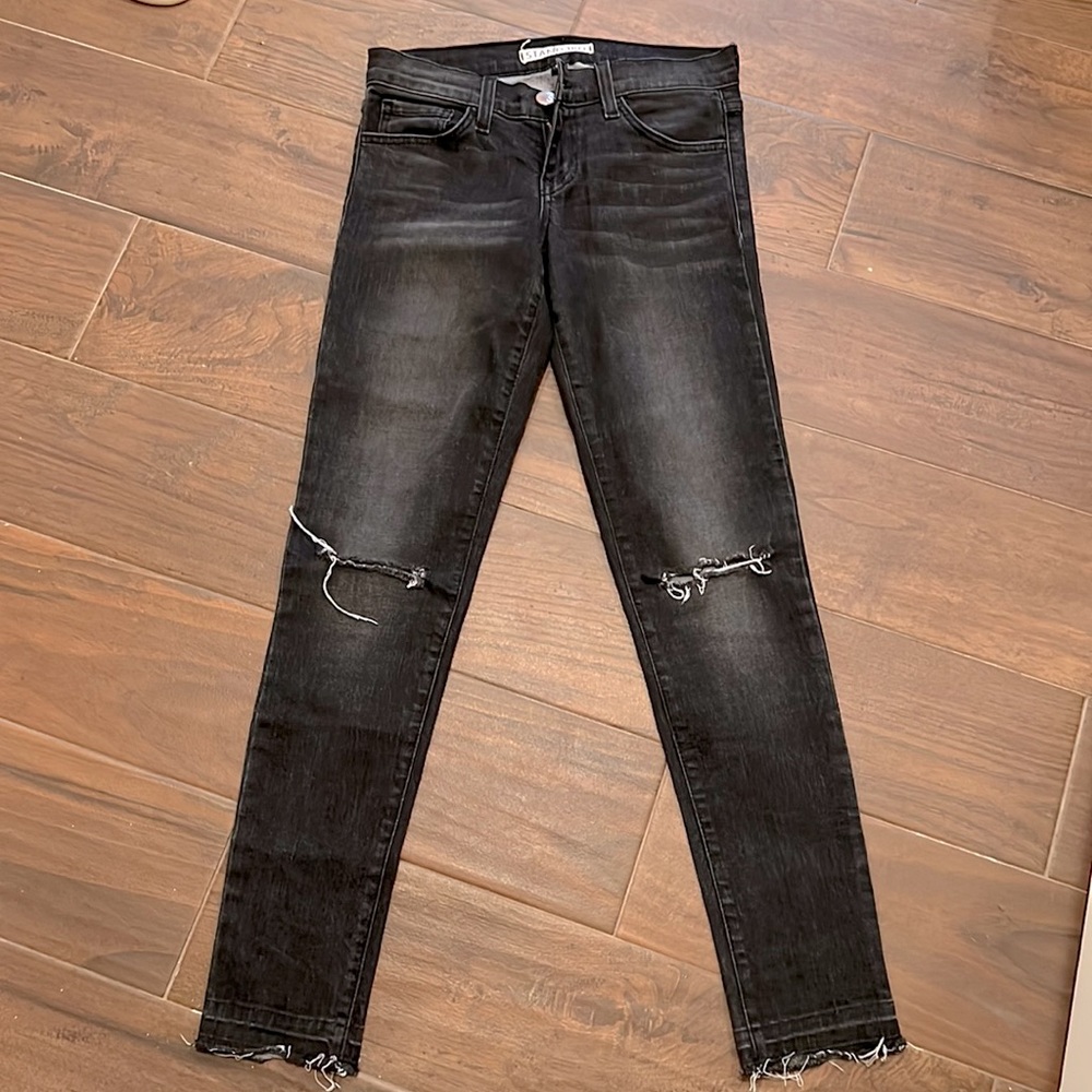 Black faded jeans w/light distressing and raw hem perfect condition sz 25